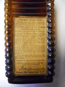 Back Label of 6 Log Drake's Plantation Bitters and Old Homestead Tonic, New York